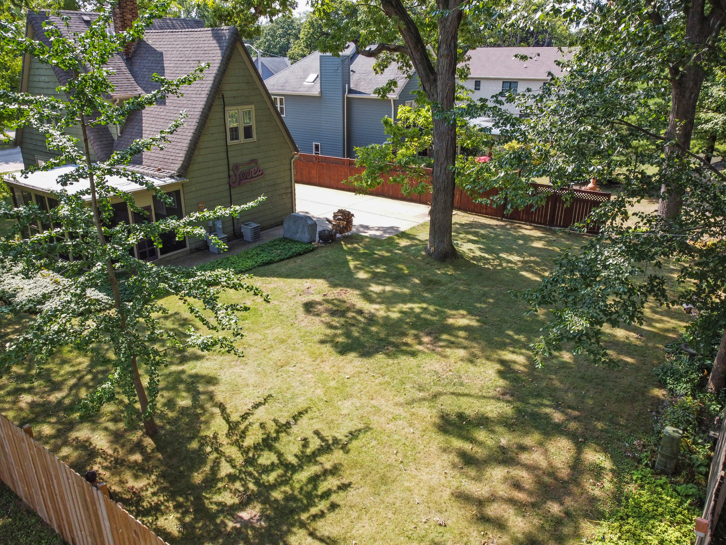 501 Dodson Street Geneva, IL 60134 - Photo 18 of 23 a view of a house with a yard