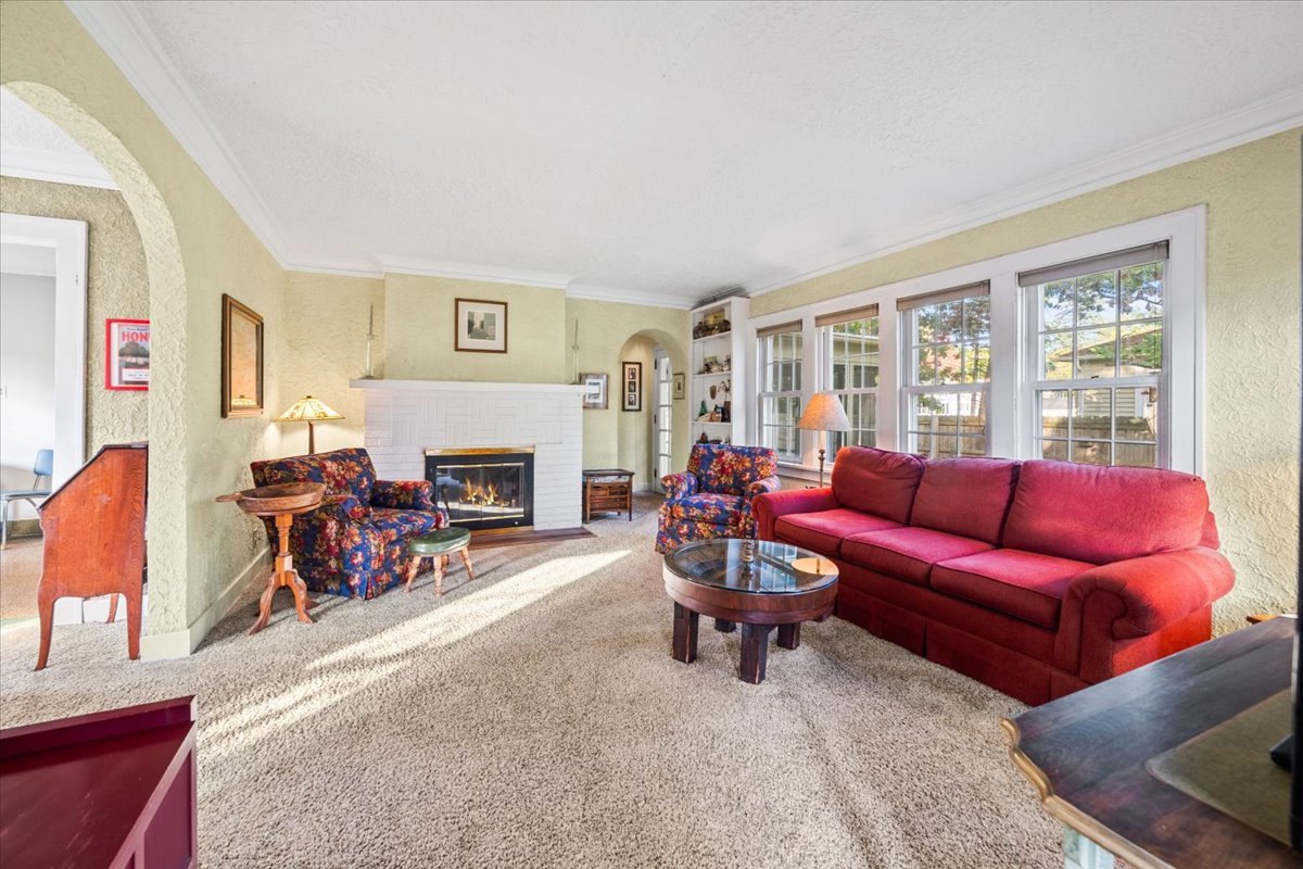 501 Dodson Street Geneva, IL 60134 - Photo 3 of 23 a living room with furniture and a fireplace