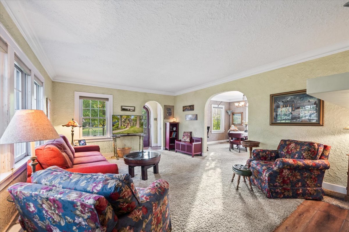501 Dodson Street Geneva, IL 60134 - Photo 5 of 23 a living room with furniture and a large window