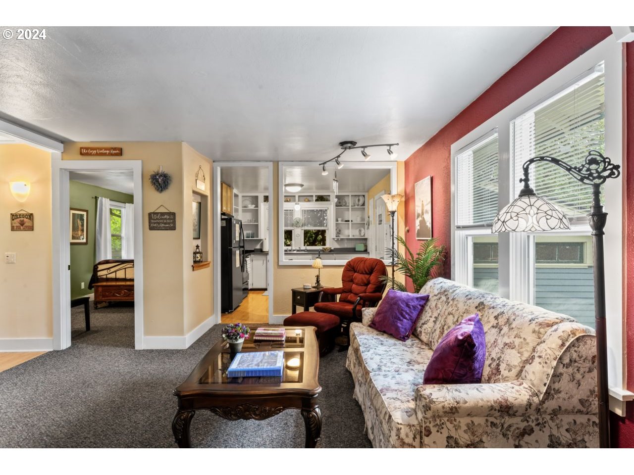 1040 Jefferson Street Eugene, OR 97402 - Photo 13 of 36 a living room with furniture fireplace and a large window
