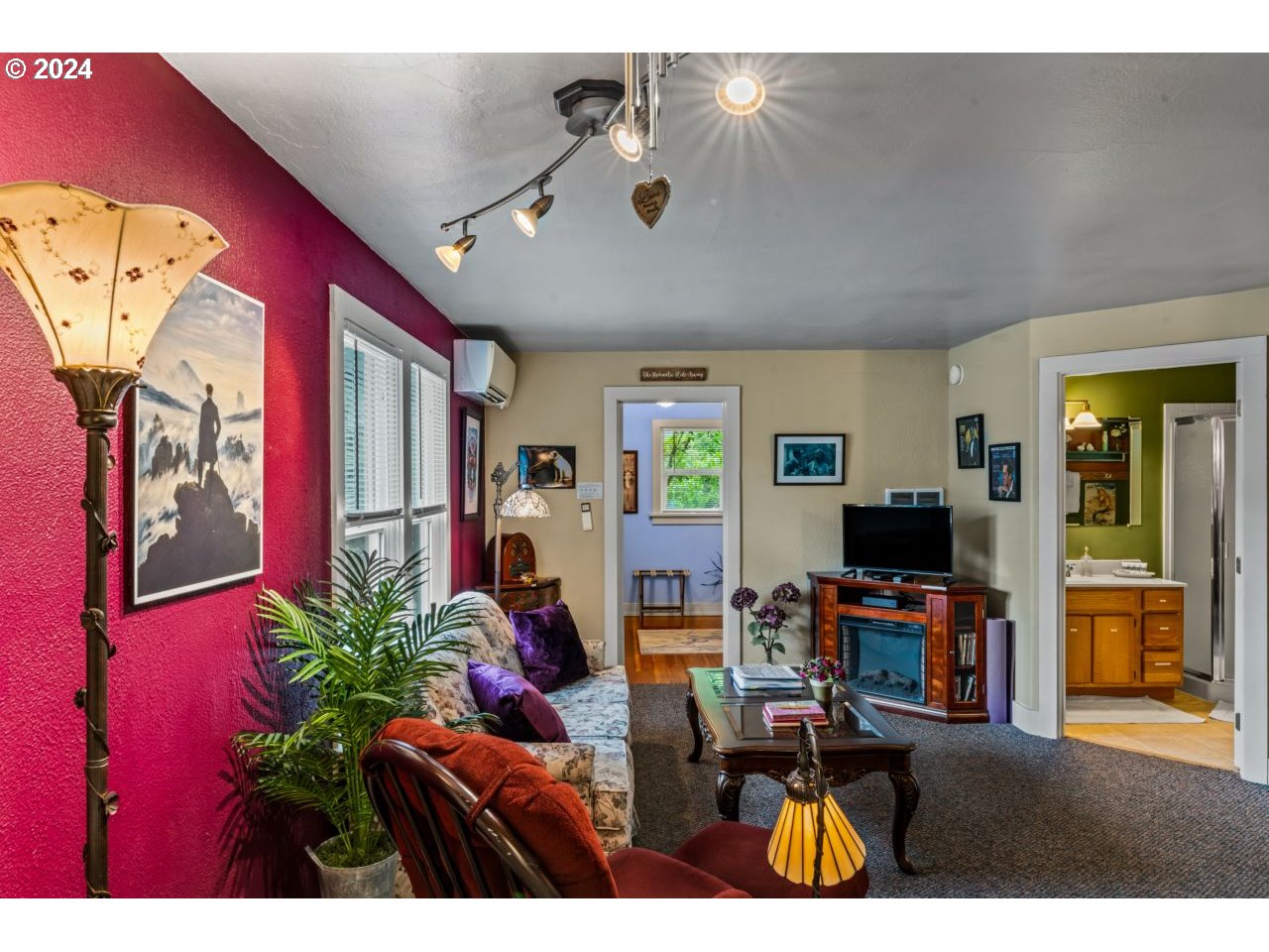 1040 Jefferson Street Eugene, OR 97402 - Photo 14 of 36 a living room with furniture and a flat screen tv