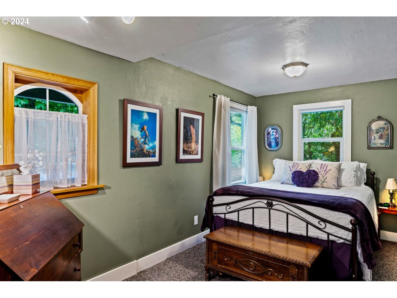 1040 Jefferson Street Eugene, OR 97402 - Photo 19 of 36 a bedroom with furniture window and a flat screen tv