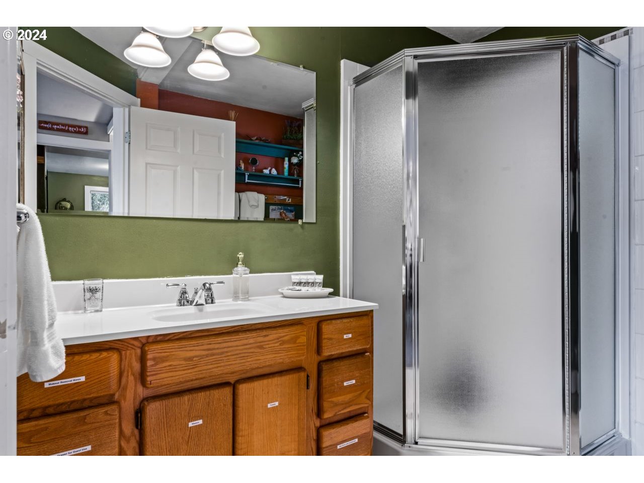 1040 Jefferson Street Eugene, OR 97402 - Photo 21 of 36 a bathroom with a sink and a mirror