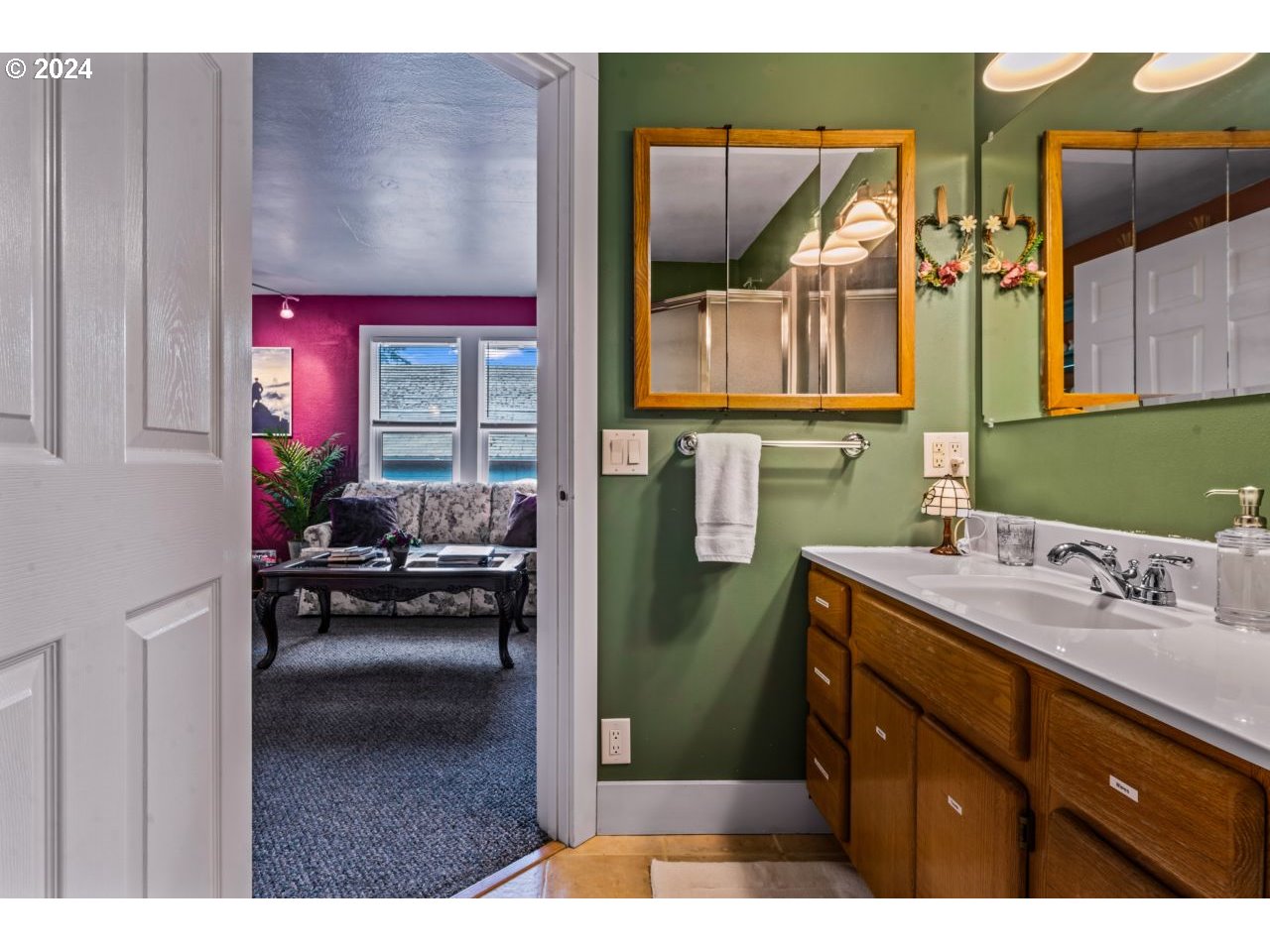 1040 Jefferson Street Eugene, OR 97402 - Photo 22 of 36 a kitchen with a refrigerator a sink and a cabinets