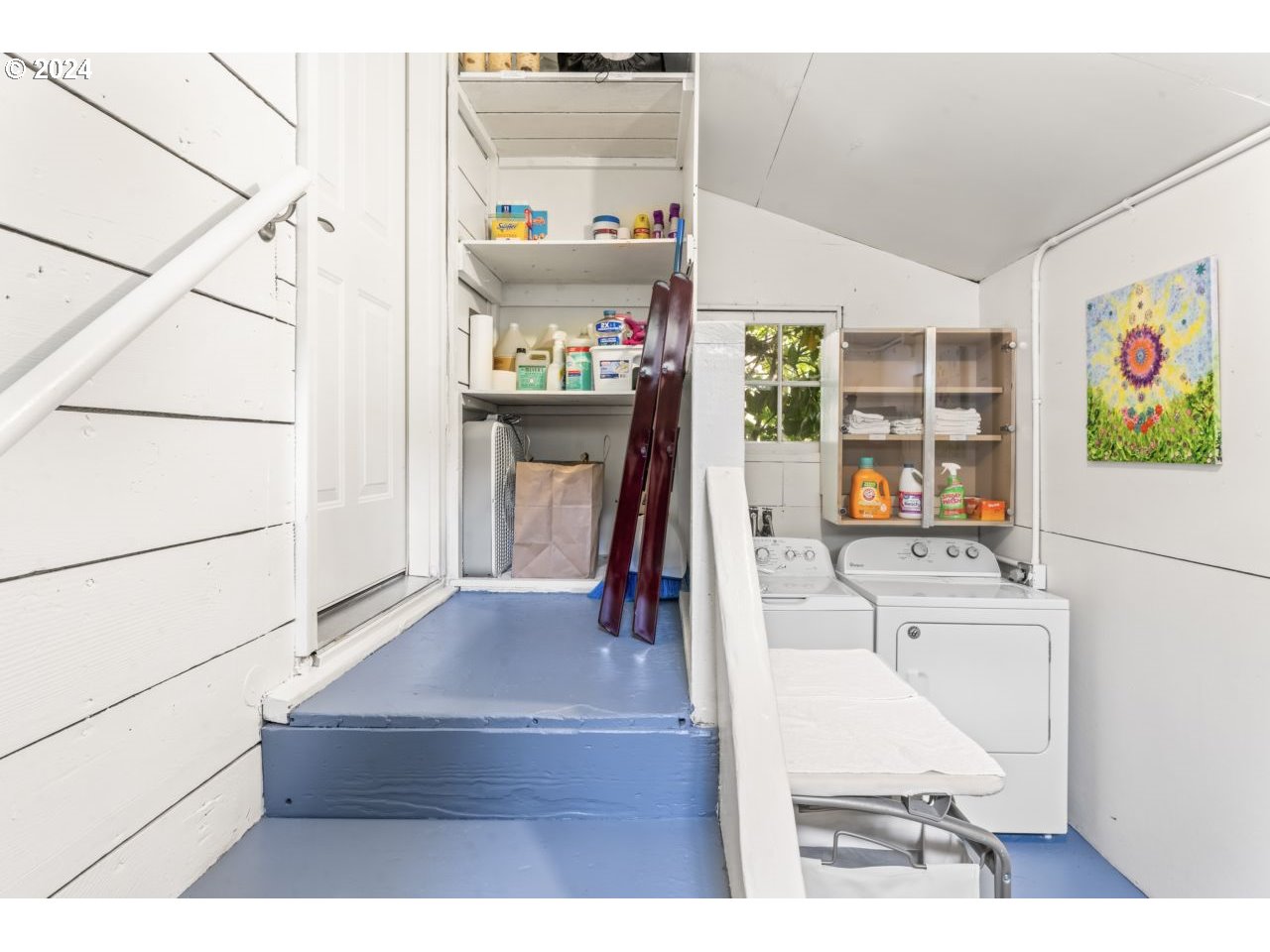 1040 Jefferson Street Eugene, OR 97402 - Photo 24 of 36 a living room with furniture and a flat screen tv