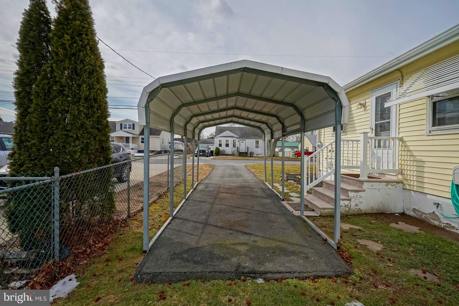 10 Eaton Road Pennsville, NJ 08070 - Photo 21 of 31 Carport with Asphalt Driveway
