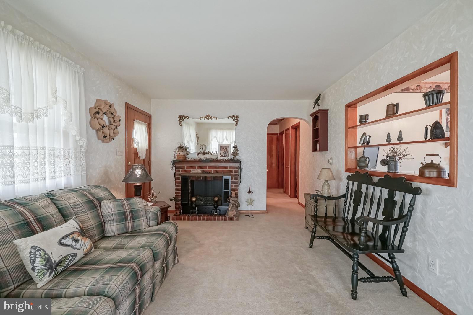 10 Eaton Road Pennsville, NJ 08070 - Photo 5 of 31 Living Room with Decorative Fireplace