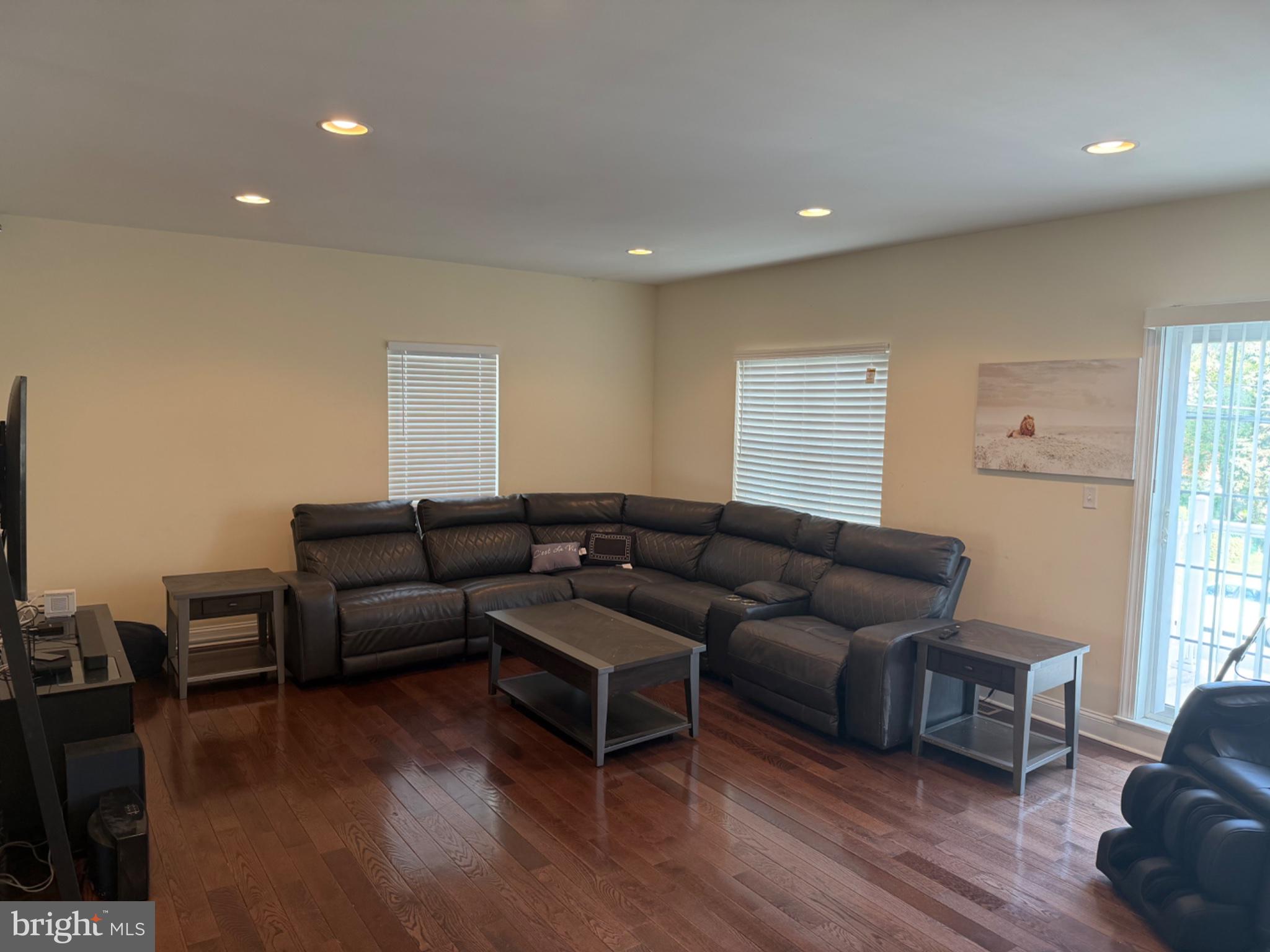 7804 Large Street Philadelphia, PA 19152 - Photo 14 of 42 a living room with furniture and a wooden floor