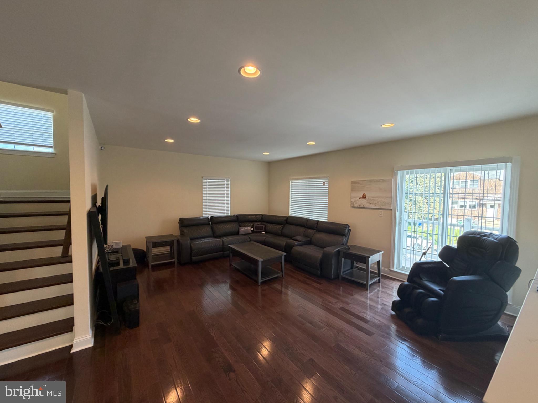 7804 Large Street Philadelphia, PA 19152 - Photo 15 of 42 a living room with furniture and wooden floor