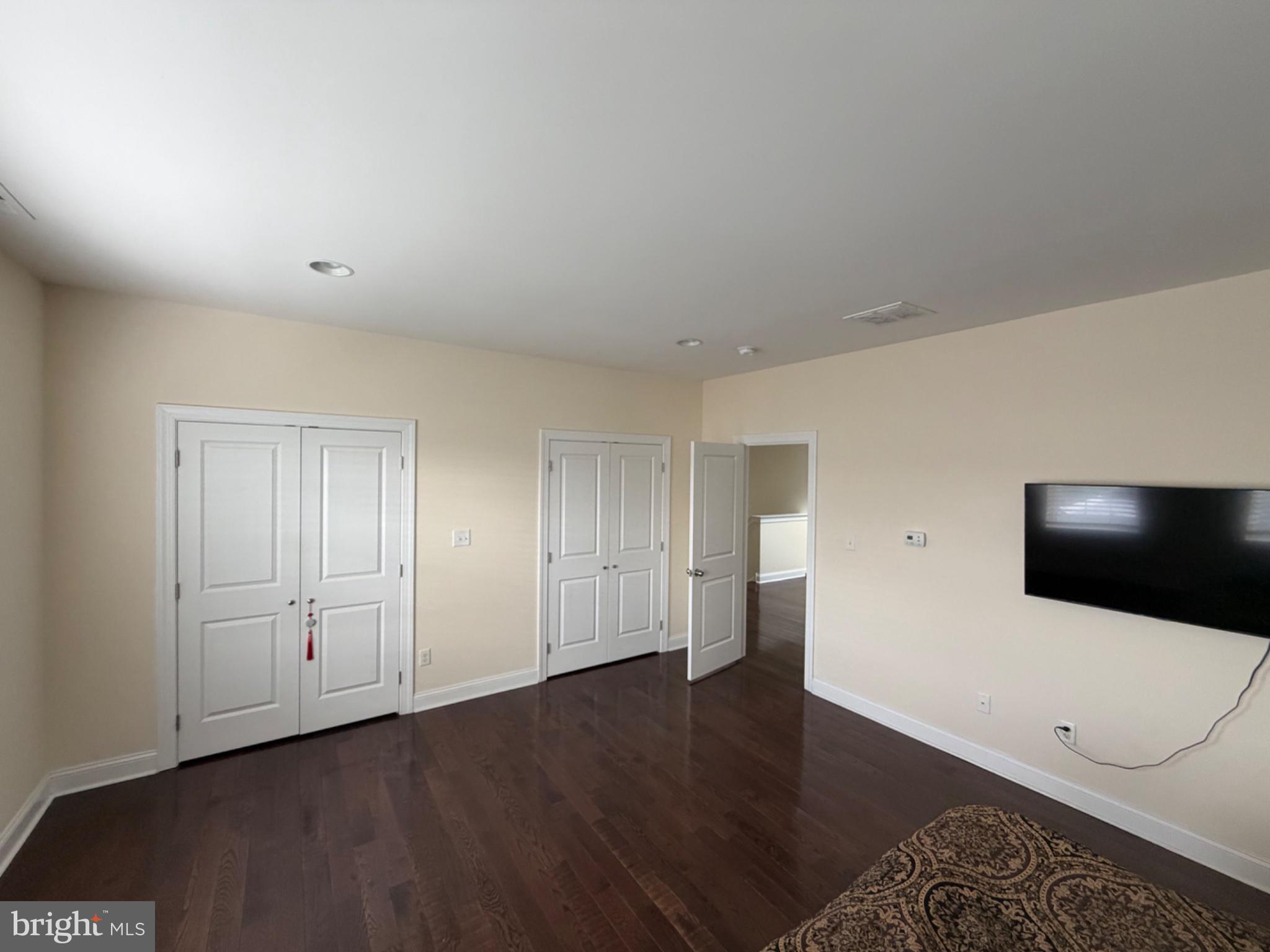 7804 Large Street Philadelphia, PA 19152 - Photo 35 of 42 a view of a livingroom with an empty space and a fireplace