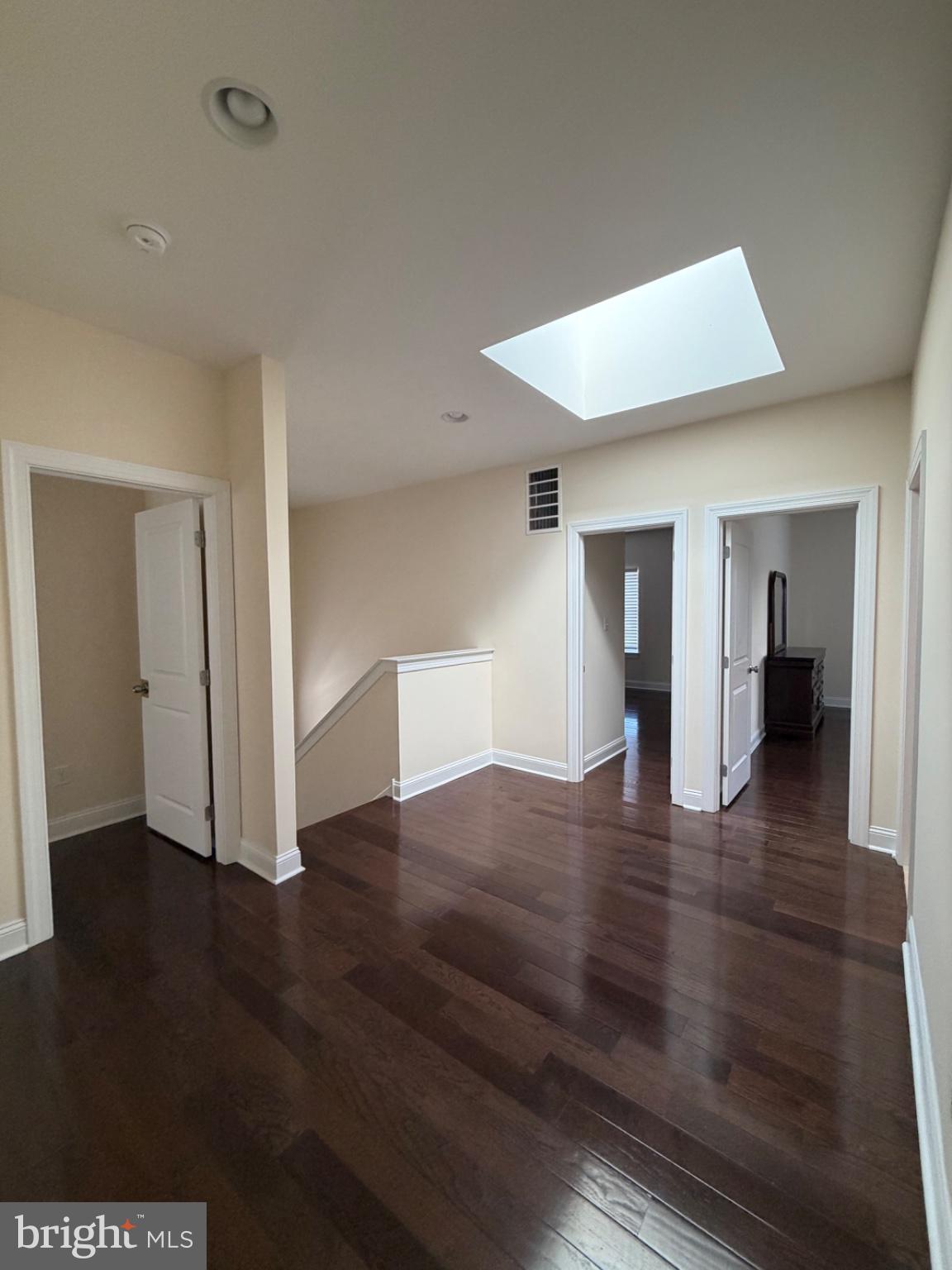 7804 Large Street Philadelphia, PA 19152 - Photo 41 of 42 a view of an empty room with wooden floor and a cabinet
