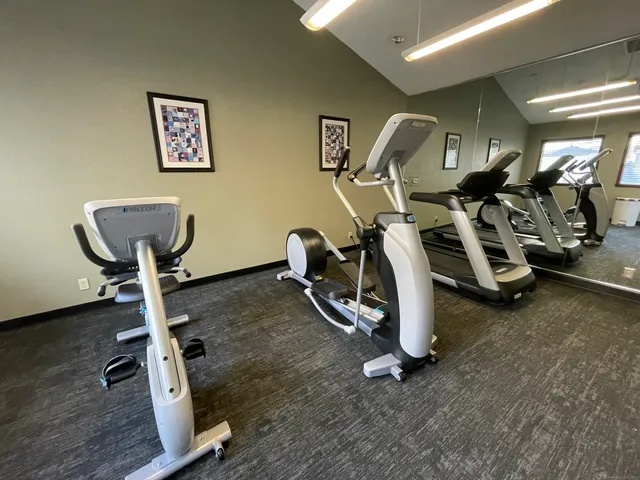 a view of a room with gym equipment
