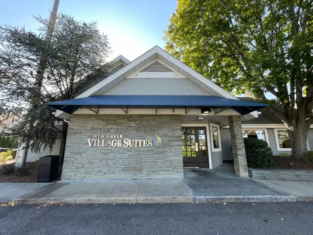 a front view of a house with a garage