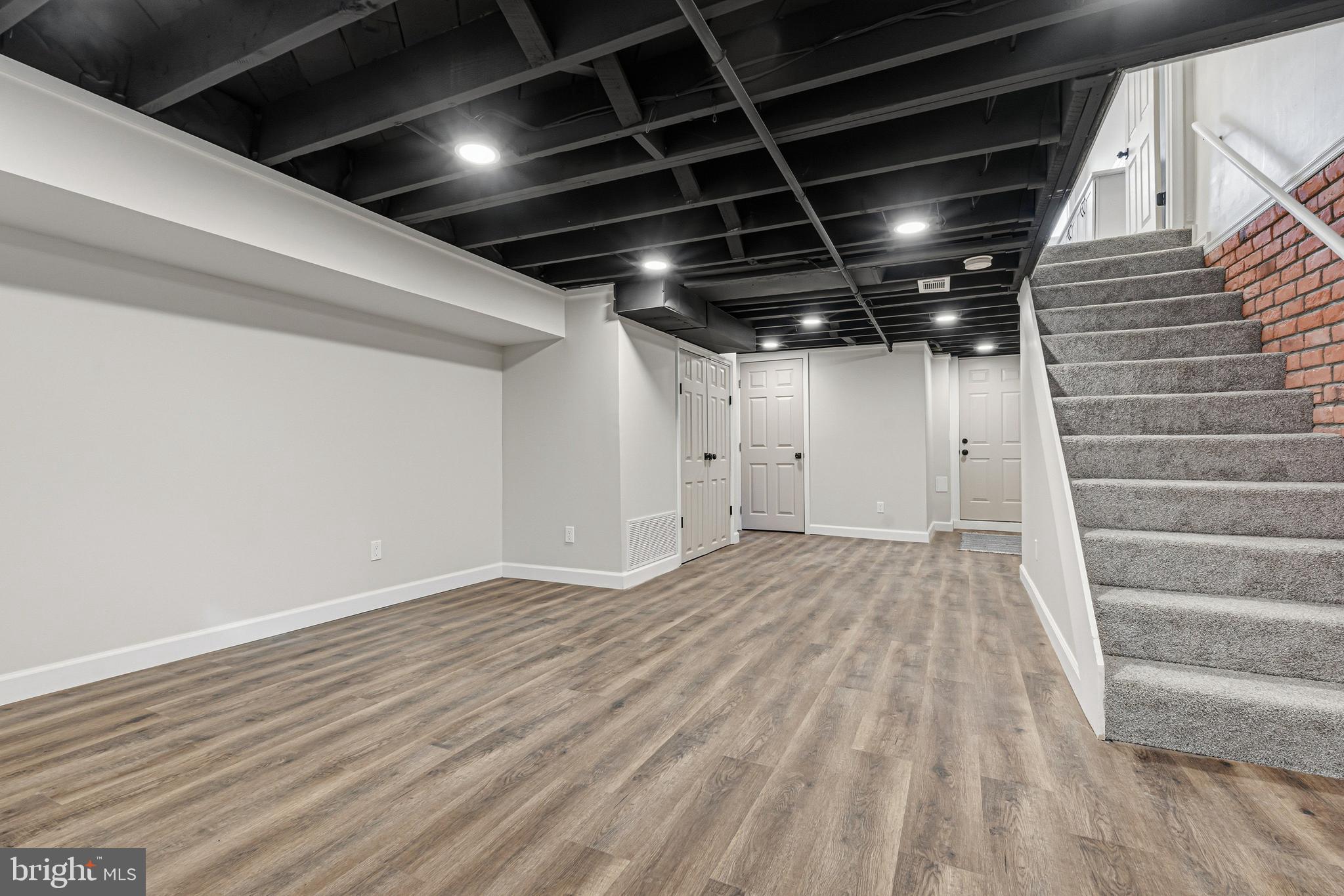 1326 Tompkins Street Baltimore, MD 21225 - Photo 11 of 34 a view of room with stairs
