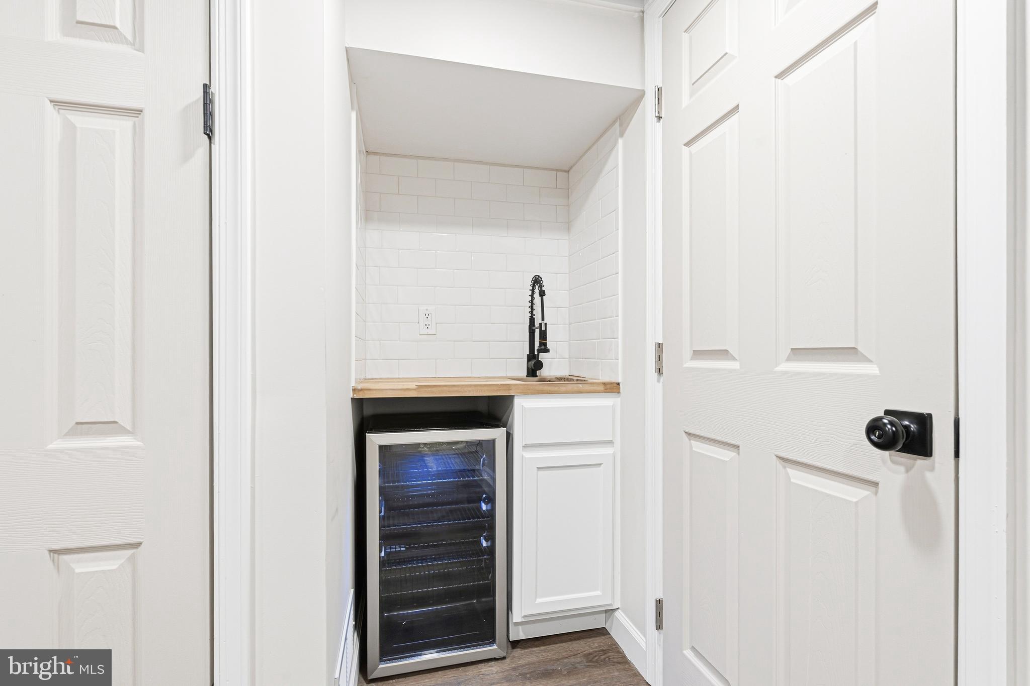 1326 Tompkins Street Baltimore, MD 21225 - Photo 13 of 34 a bathroom with a shower and a sink