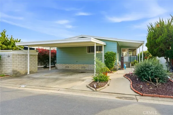 front view of a house with a patio