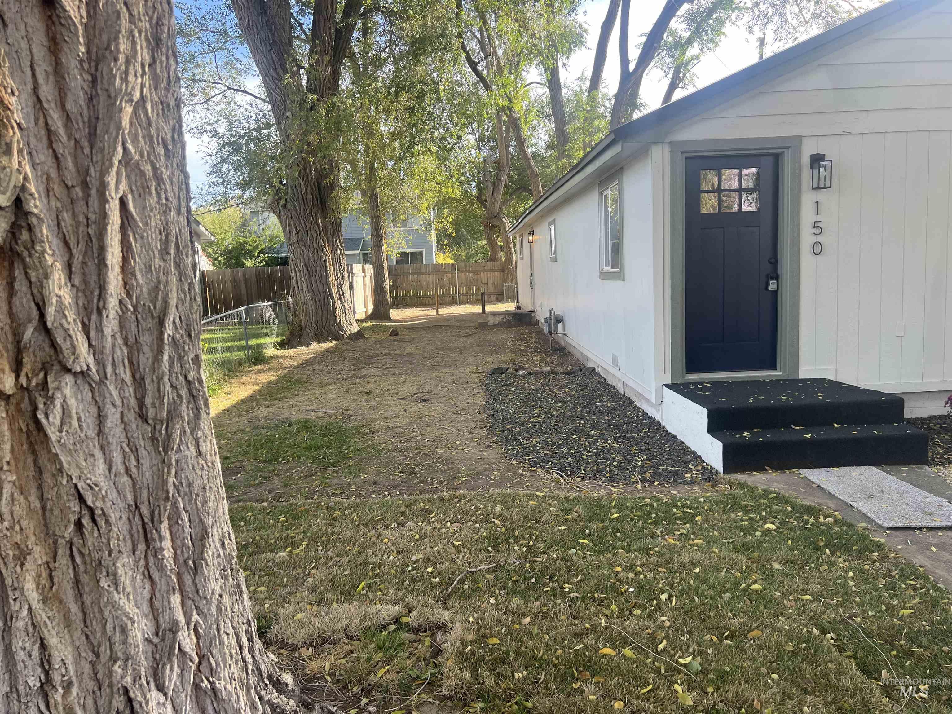 150 Roosevelt Street Mountain Home, ID 83647 - Photo 3 of 16 View of fenced backyard
