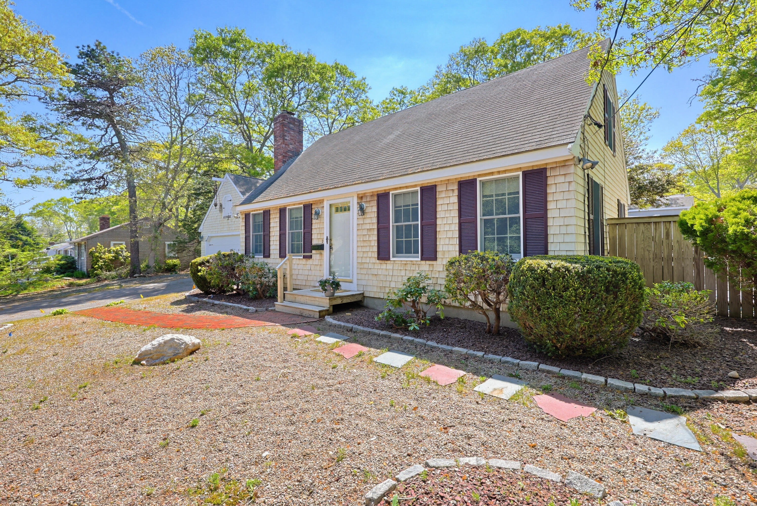 556 Cotuit Road Mashpee, MA 02649 - Photo 44 of 45 a view of a house with backyard and garden