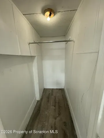 a view of a livingroom and a window