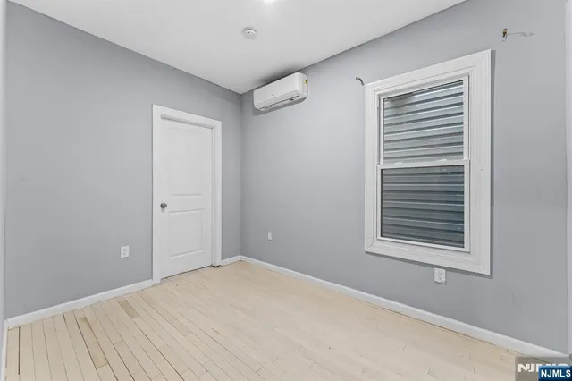 a view of a room that has a window in it