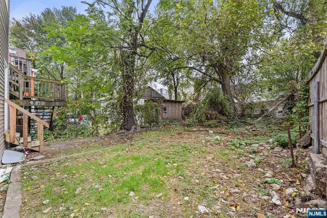 a fire hydrant in the middle of a field