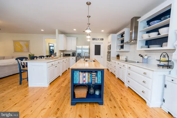 a kitchen with a stove and a sink