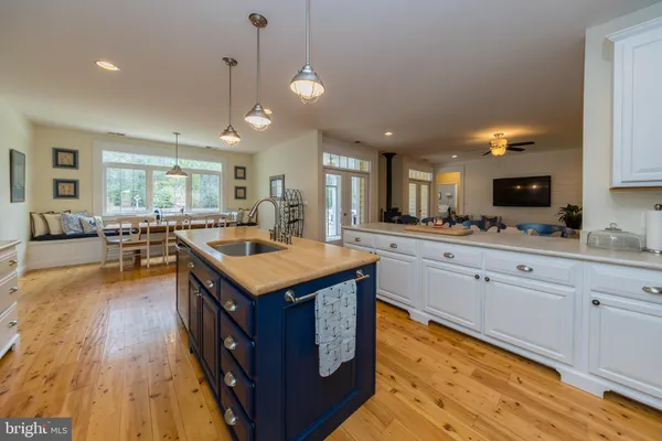 a view of a dining room with furniture and entryway