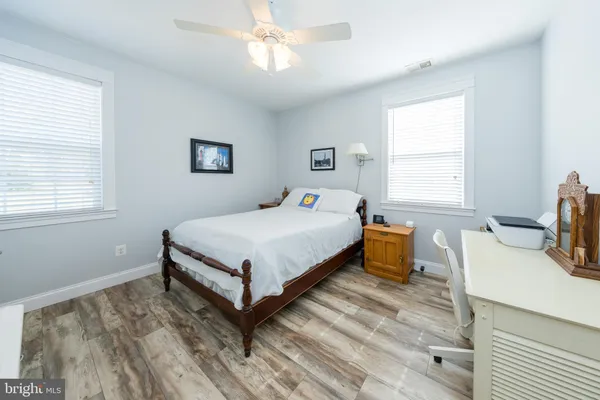 a room with furniture and a flat screen tv