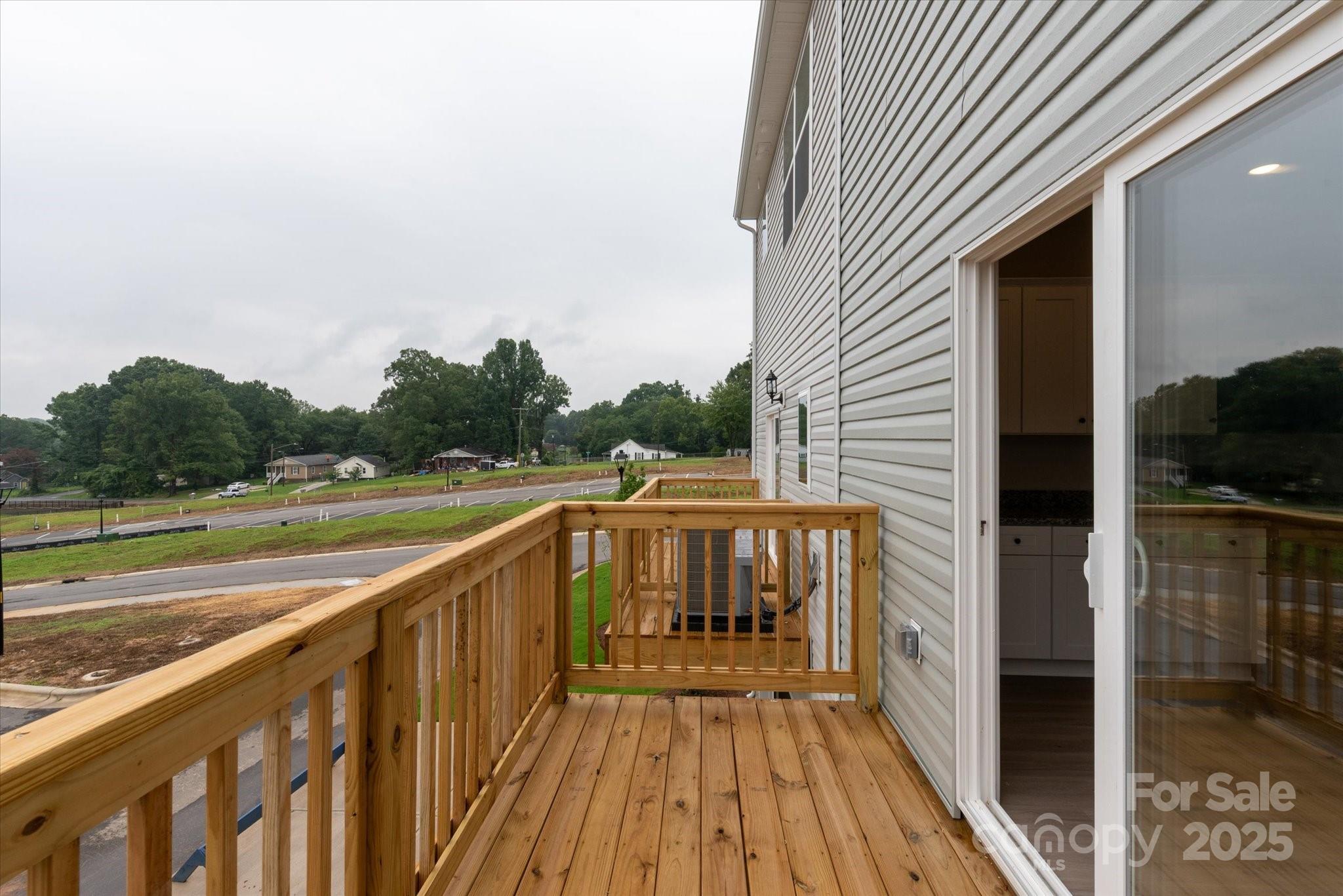 1834 Rhyne Elementary Drive Gastonia, NC 28052 - Photo 18 of 20 a view of balcony with wooden floor and fence