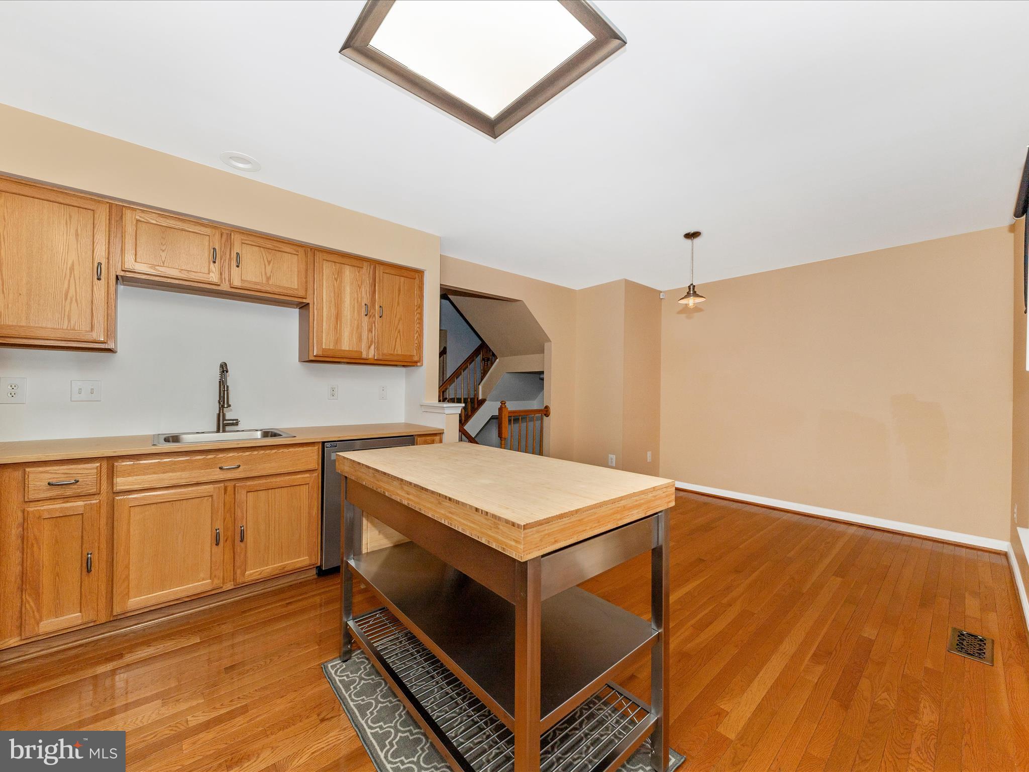 1351 Mare Street Ranson, WV 25438 - Photo 15 of 52 a kitchen that has a sink and a stove in it