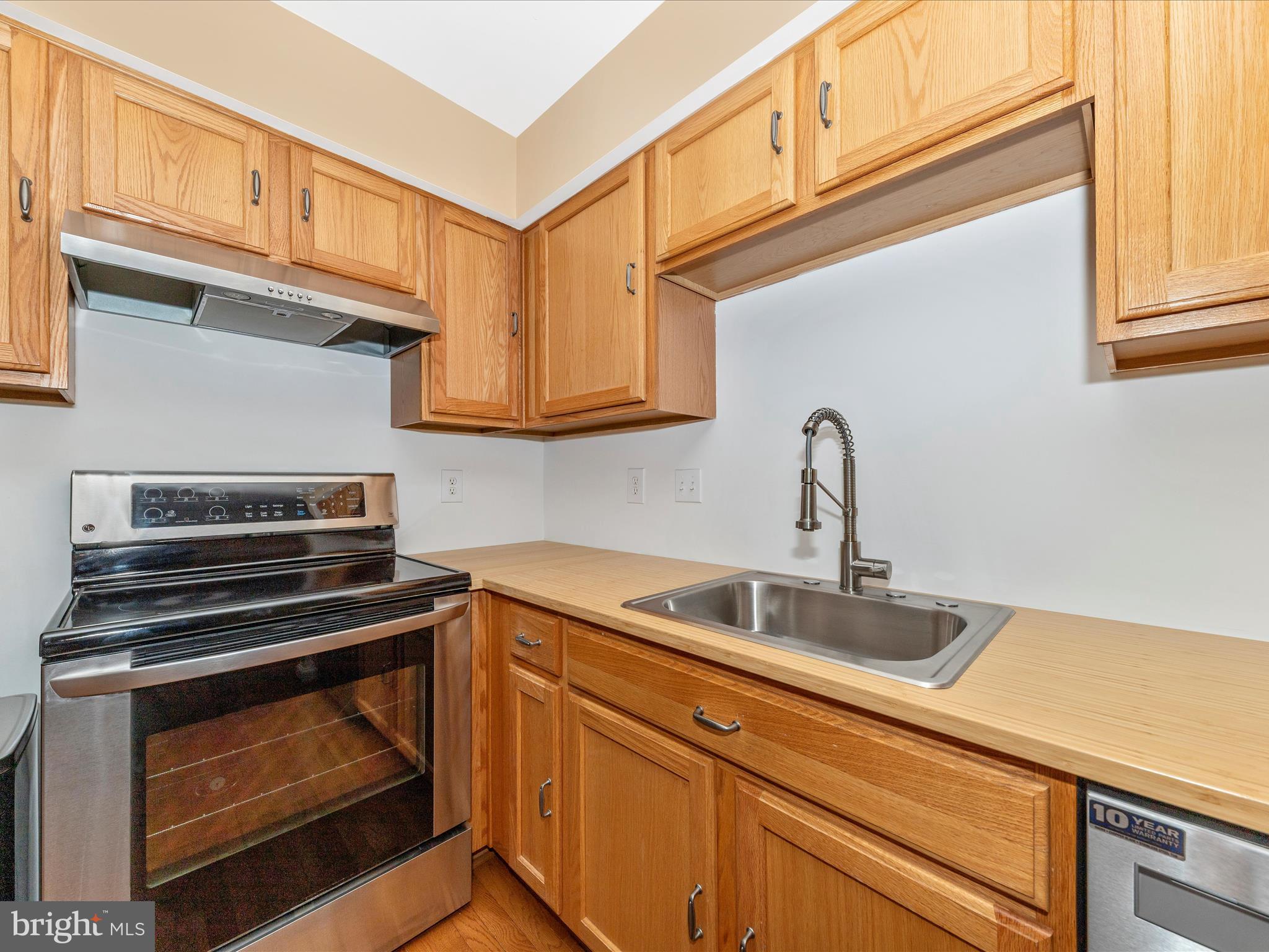 1351 Mare Street Ranson, WV 25438 - Photo 16 of 52 a kitchen with cabinets and appliances
