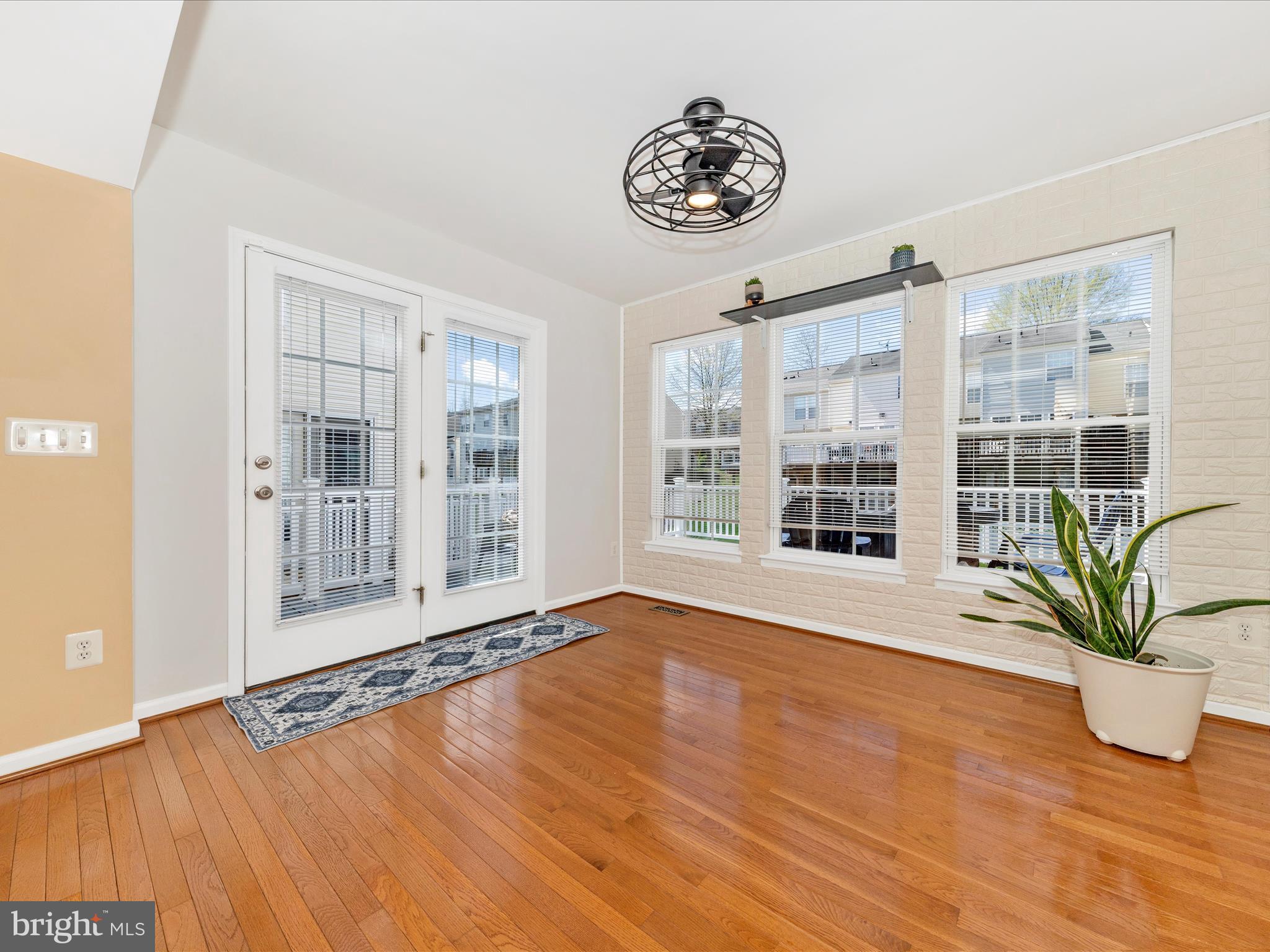 1351 Mare Street Ranson, WV 25438 - Photo 19 of 52 a view of an empty room with a window and wooden floor