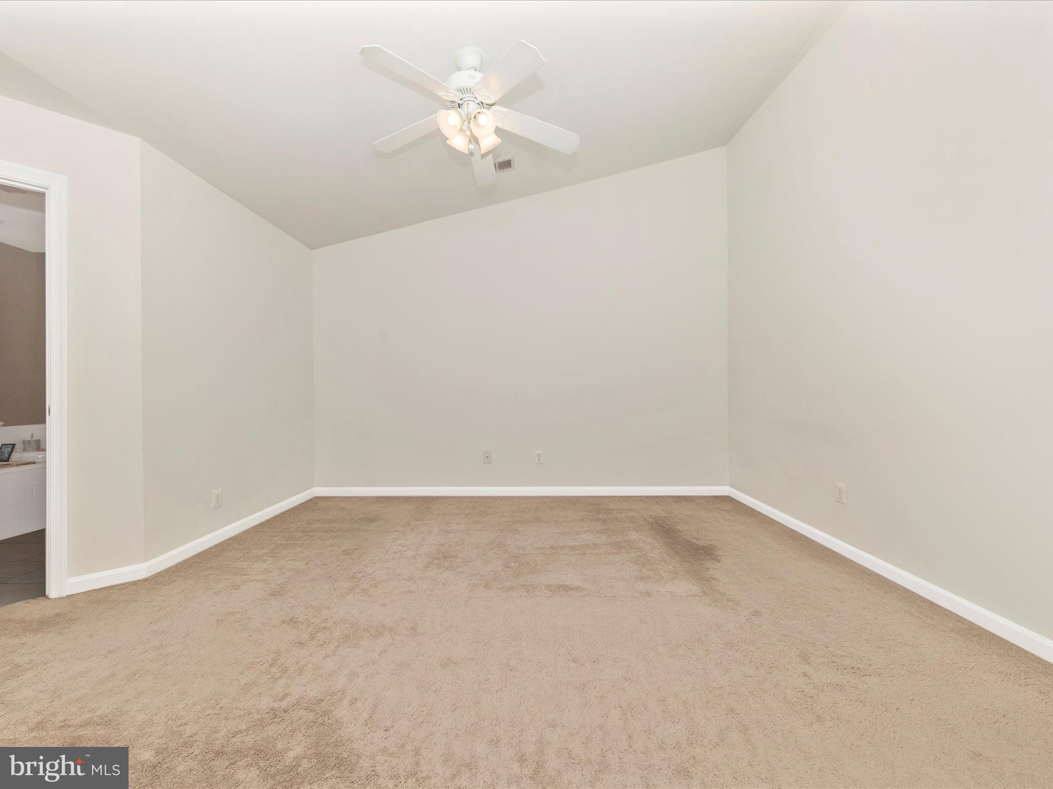 1351 Mare Street Ranson, WV 25438 - Photo 30 of 52 an empty room with a fan & a window