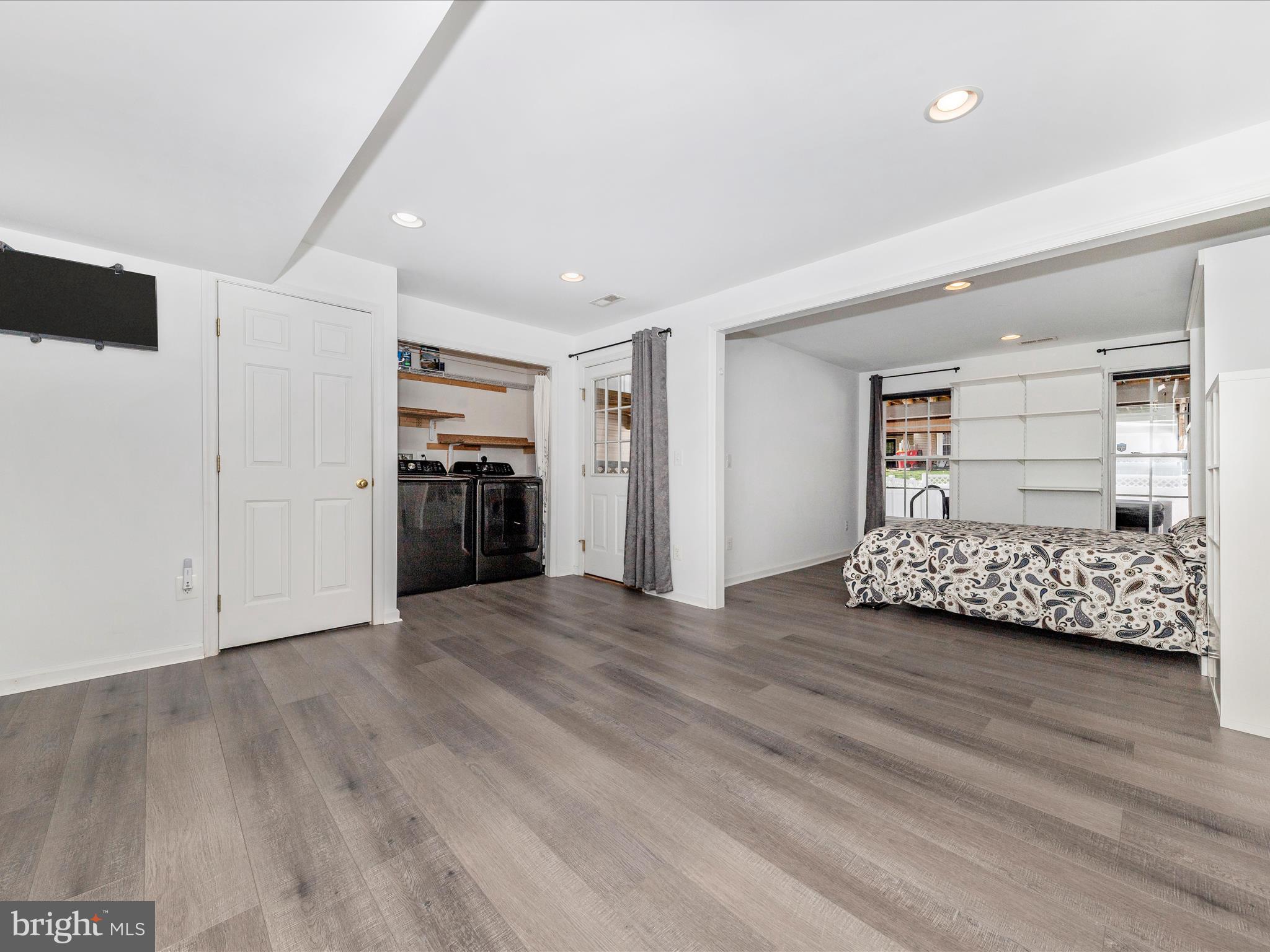 1351 Mare Street Ranson, WV 25438 - Photo 5 of 52 a view of a bedroom with a furniture and a ceiling fan