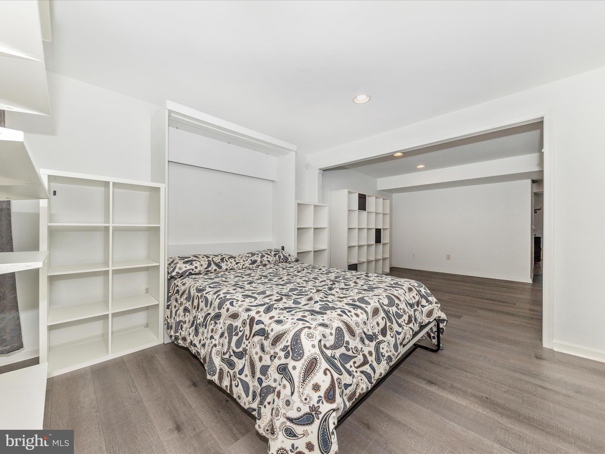 1351 Mare Street Ranson, WV 25438 - Photo 6 of 52 a bedroom with a bed and a cabinets