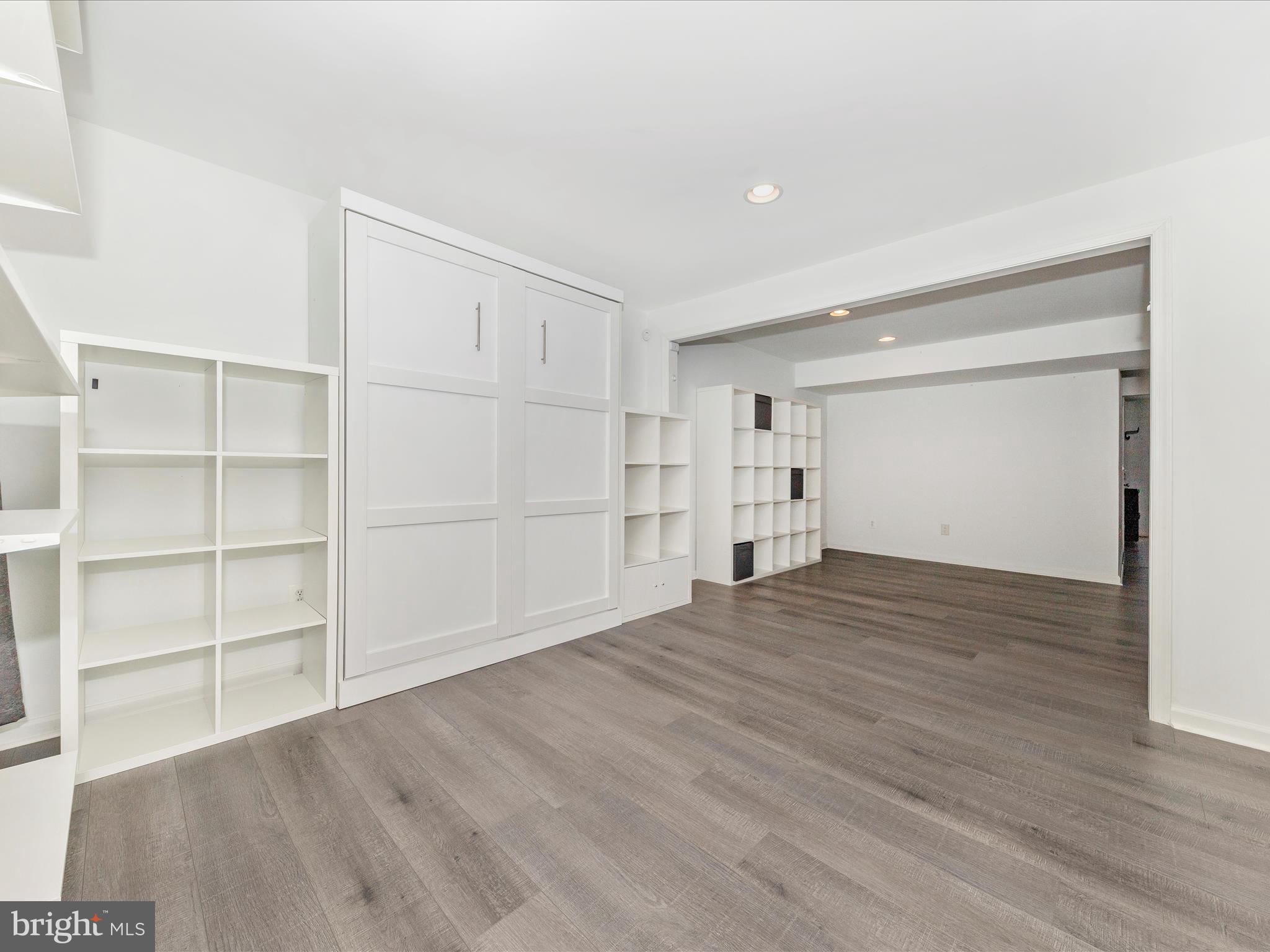 1351 Mare Street Ranson, WV 25438 - Photo 7 of 52 a view of empty room with wooden floor and cabinet