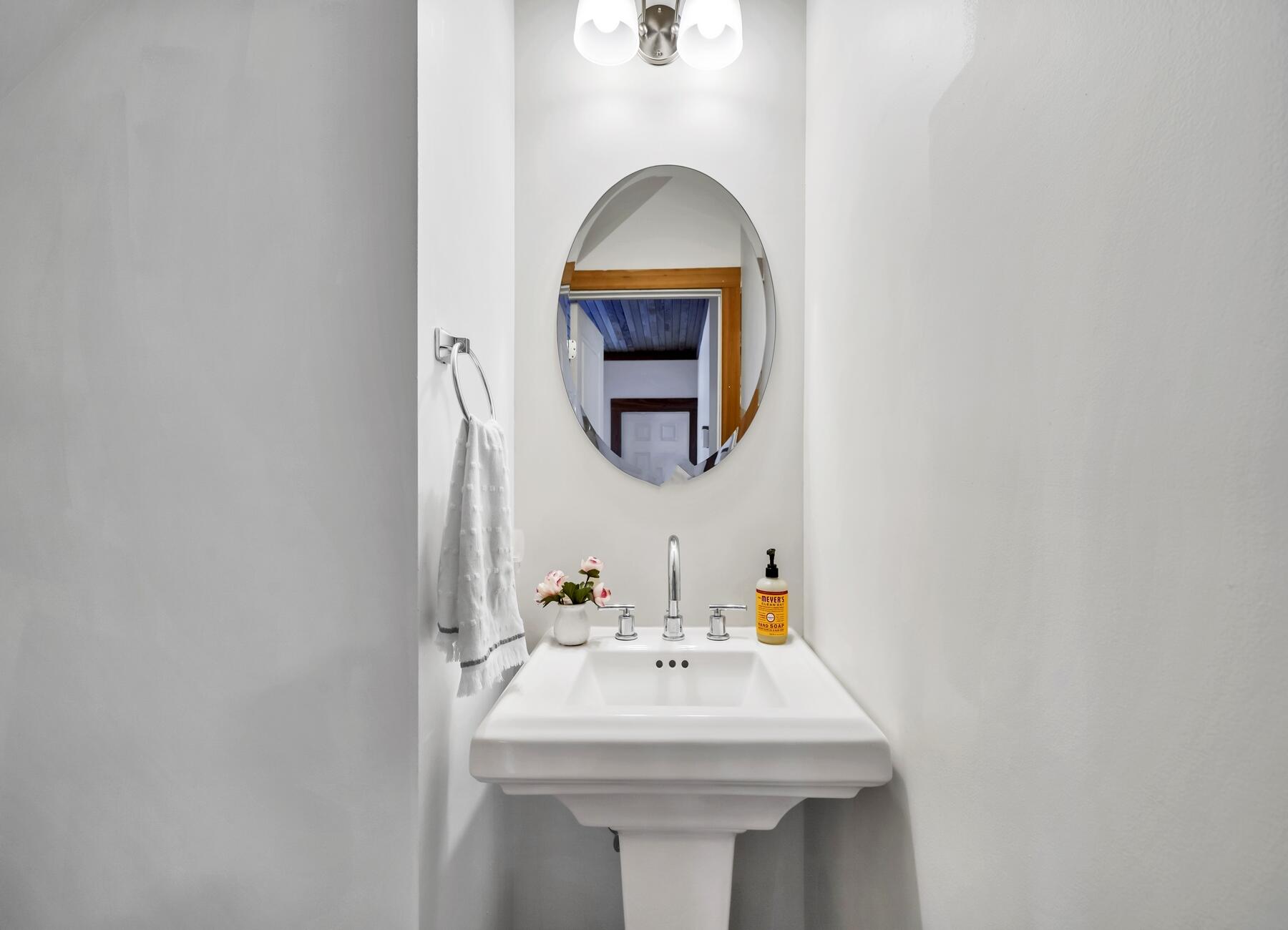 132 Hammock Oaks Boulevard Freeport, FL 32439 - Photo 24 of 45 a bathroom with a sink and a mirror