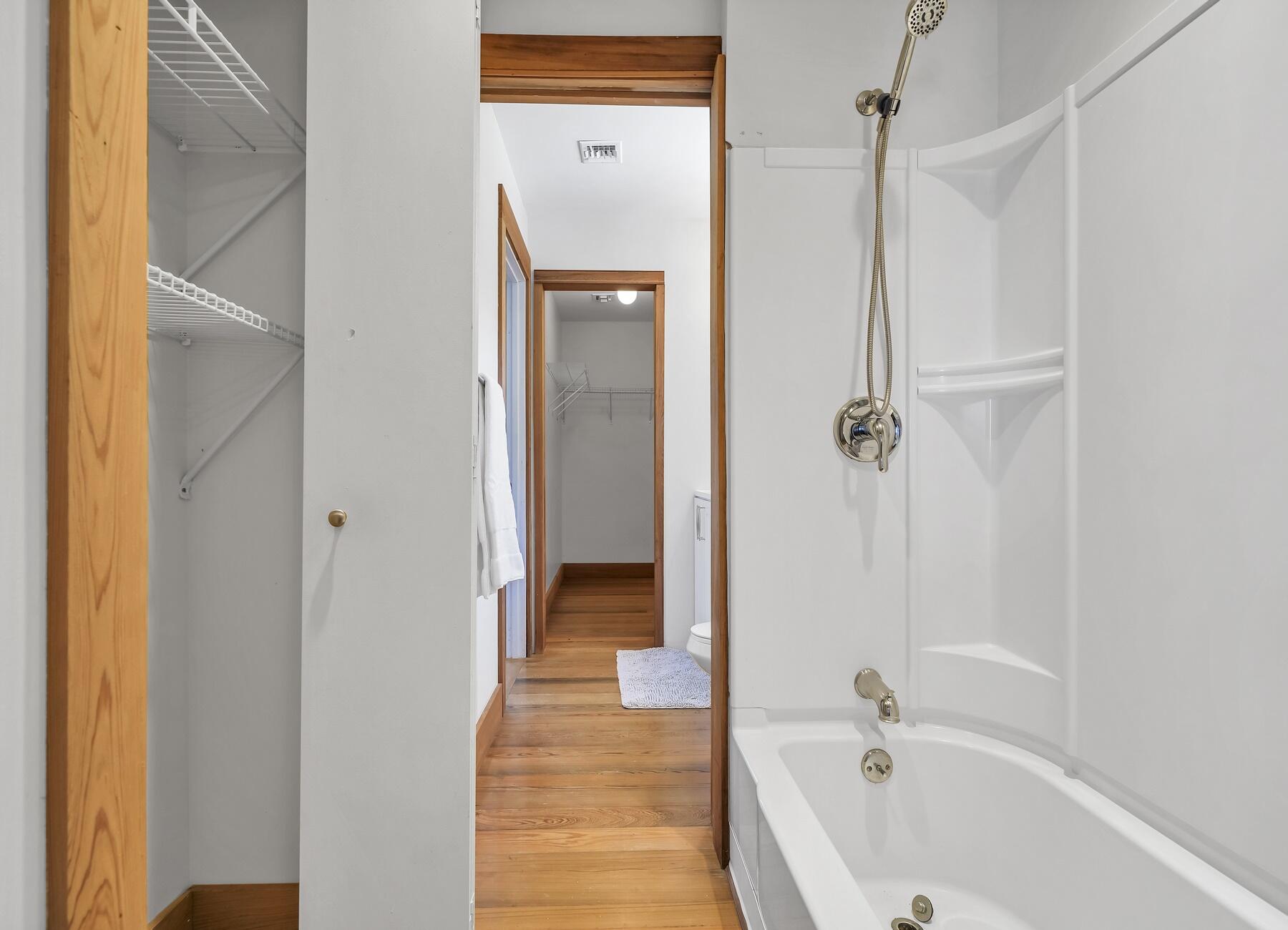132 Hammock Oaks Boulevard Freeport, FL 32439 - Photo 30 of 45 a bathroom with a bathtub and a shower
