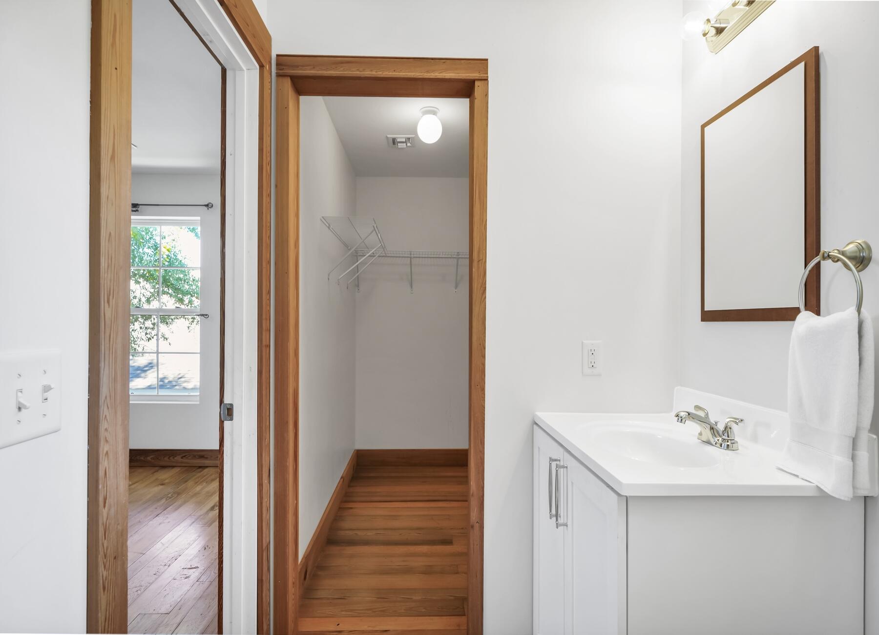 132 Hammock Oaks Boulevard Freeport, FL 32439 - Photo 31 of 45 a bathroom with a sink and a mirror