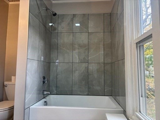 772 Rock Street Fall River, MA 02720 - Photo 11 of 17 a bathroom with a bathtub and a shower