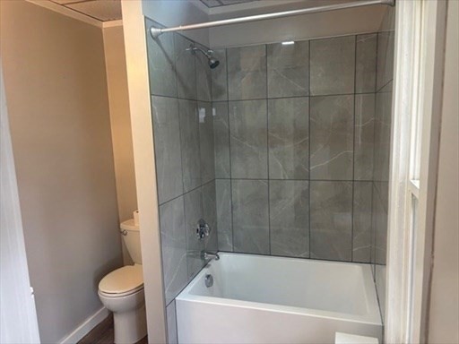 772 Rock Street Fall River, MA 02720 - Photo 12 of 17 a white bath tub sitting next to a toilet