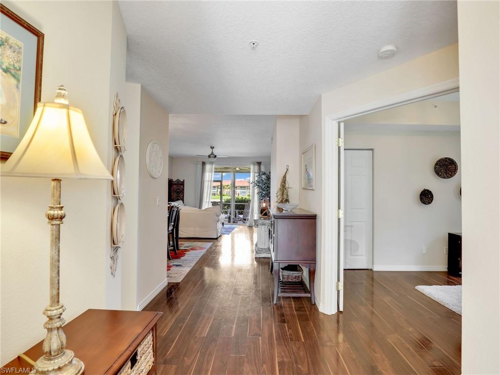 6670 Huntington Lakes Circle, Unit 104 Naples, FL 34119 - Photo 2 of 7 a view of a living room