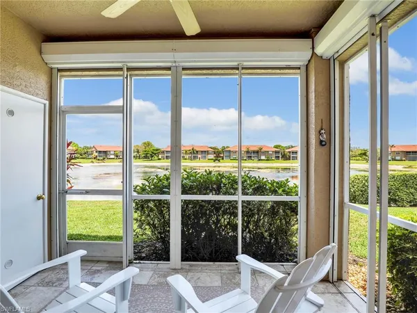 a view of a room with a large window