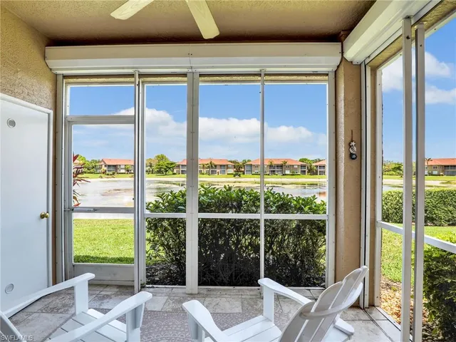a view of a room with a large window