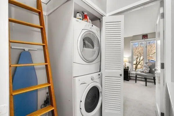 a room with a bed and a window