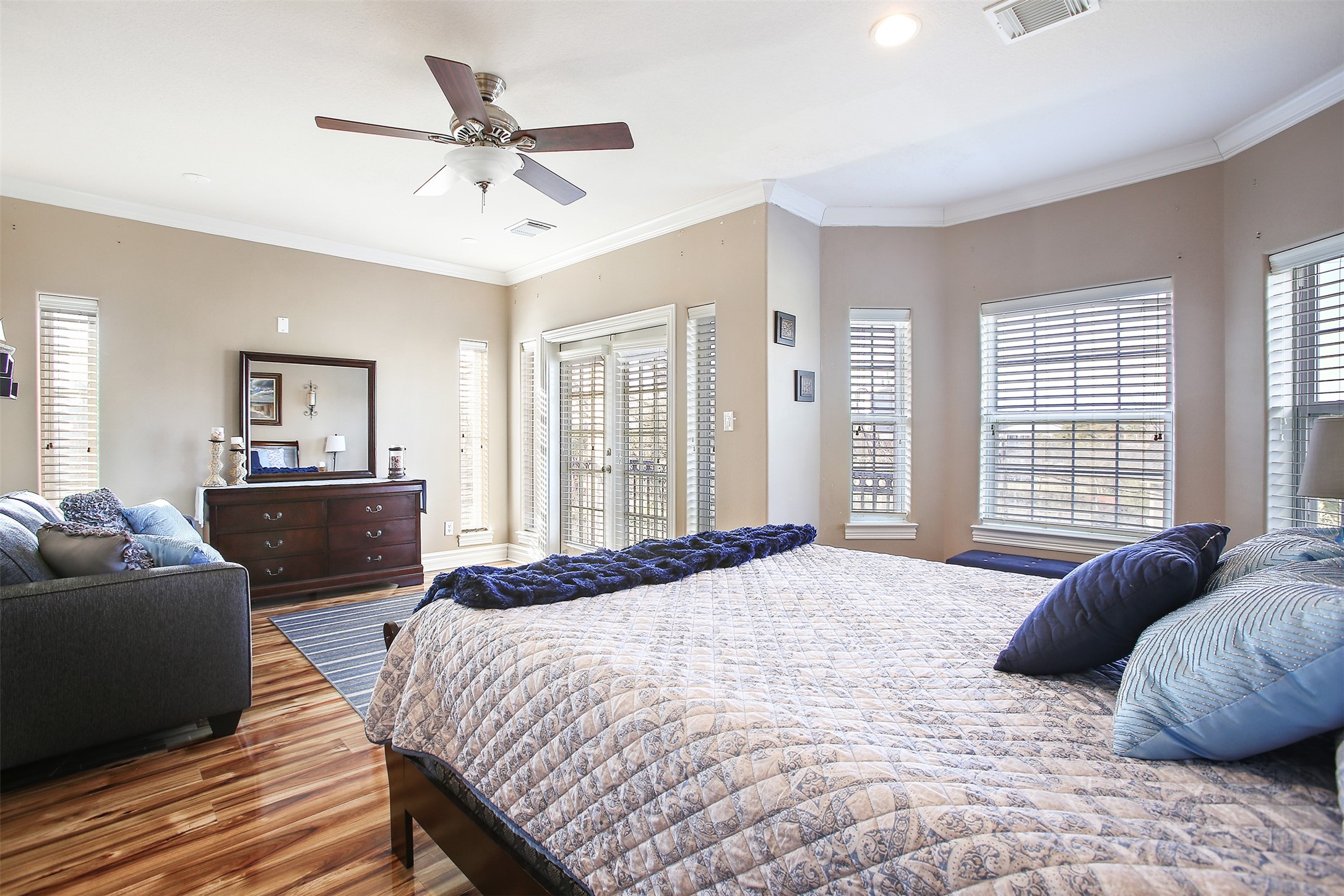 612 8th Street Kemah, TX 77565 - Photo 13 of 20 a bedroom with a bed and a couch