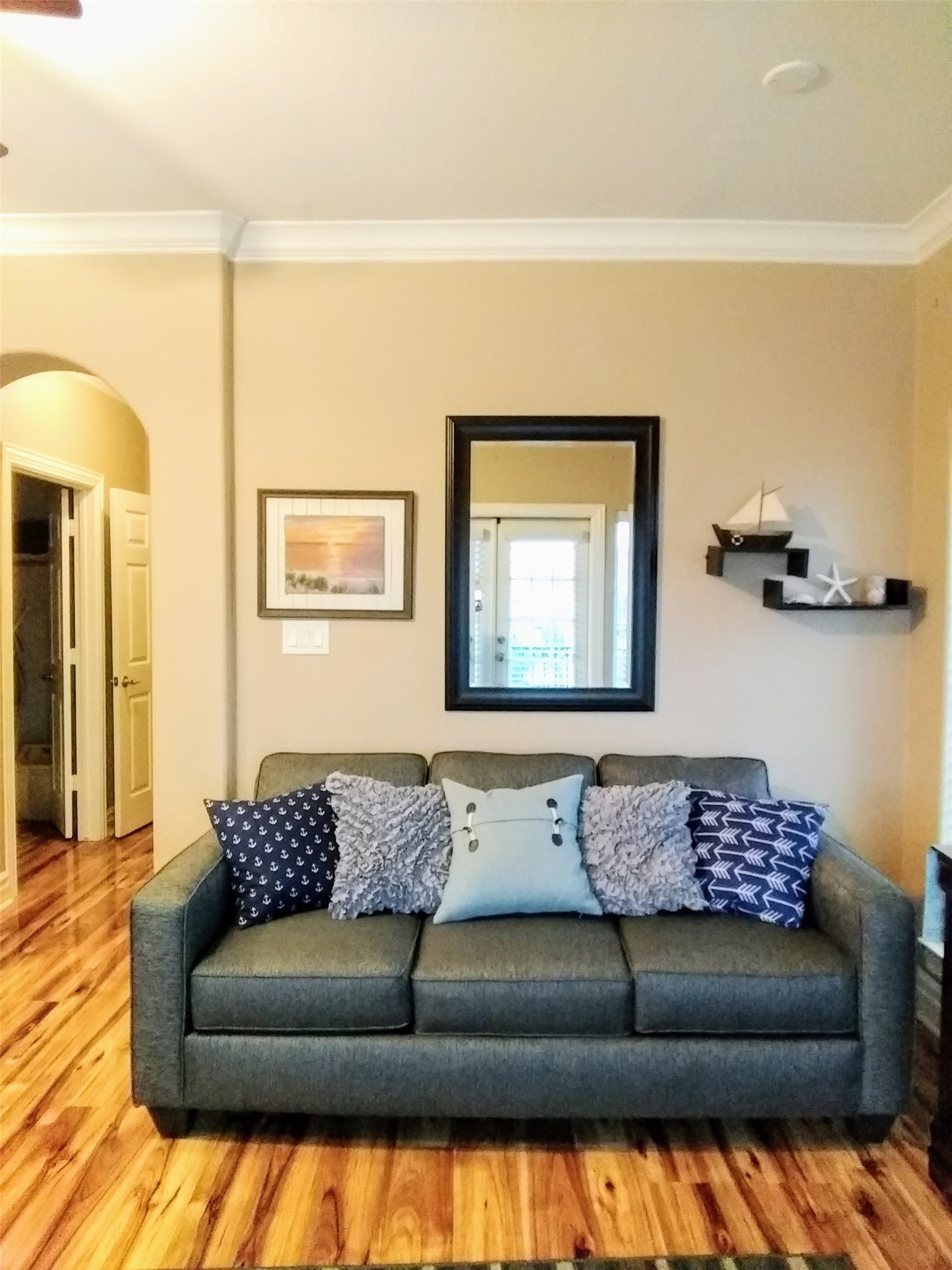 612 8th Street Kemah, TX 77565 - Photo 17 of 20 a living room with a couch and a potted plant