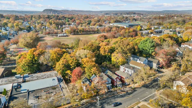 an aerial view of residential house with outdoor space