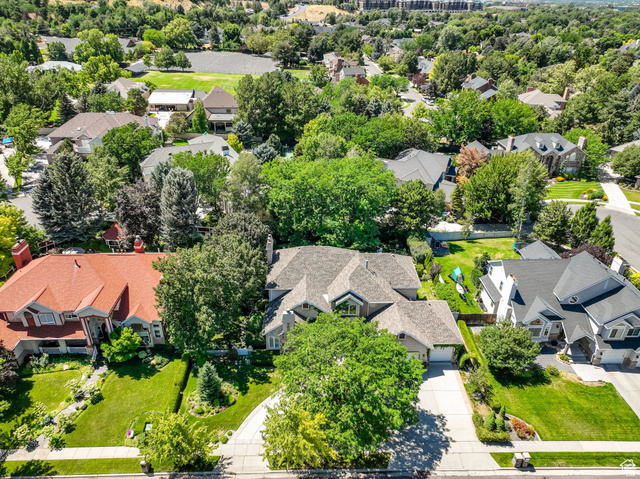 7740 Keswick Road Sandy, UT 84093 - Photo 65 of 74 Aerial perspective showcasing a residential neighborhood with varied architectural styles