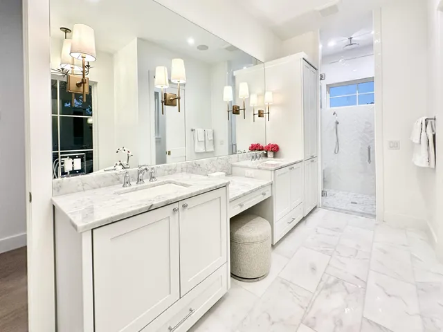 a view of walk in closet and window